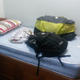 All of Doiron’s belongings. He’s since downsized to a smaller roller bag and new backpack.